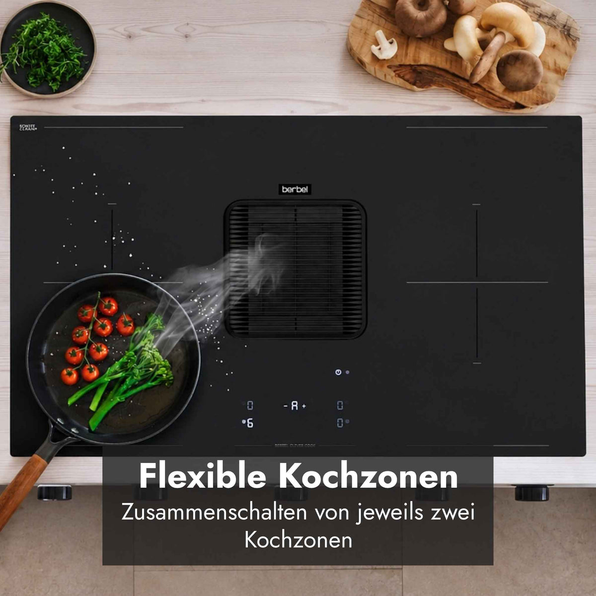 Berbel Downline Advance Kochfeld mit integriertem Abzug und flexiblen Kochzonen, bei denen jeweils zwei Kochzonen zusammengeschaltet werden können.