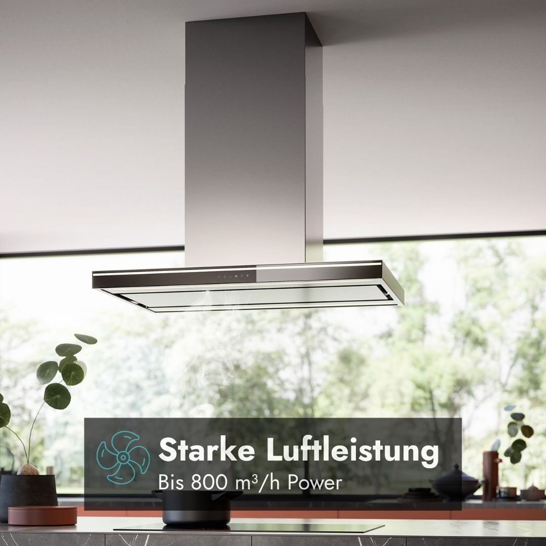 Falmec Lumina NRS Inselhaube aus Edelstahl mit hoher Luftleistung von bis zu 800 m³/h über einer modernen Kücheninsel.