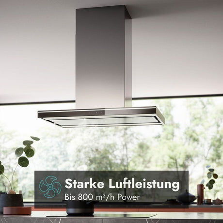 Falmec Lumina NRS Inselhaube aus Edelstahl mit hoher Luftleistung von bis zu 800 m³/h über einer modernen Kücheninsel.