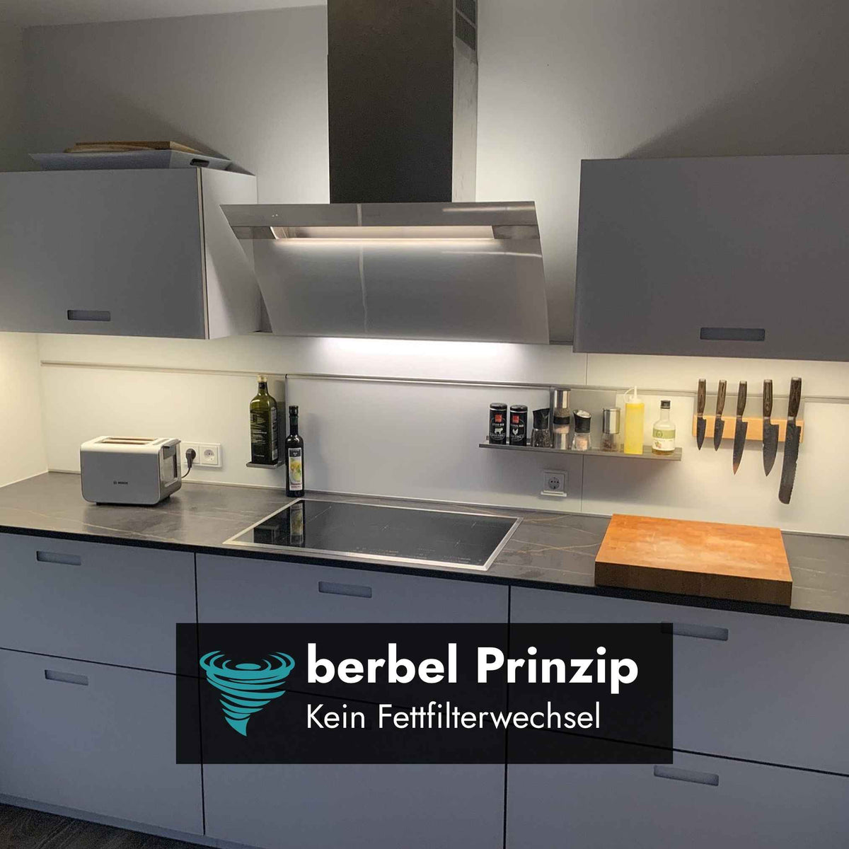 berbel Kopffreihaube Ergoline Base BKH EG-B in moderner Küche mit berbel Prinzip ohne Fettfilterwechsel